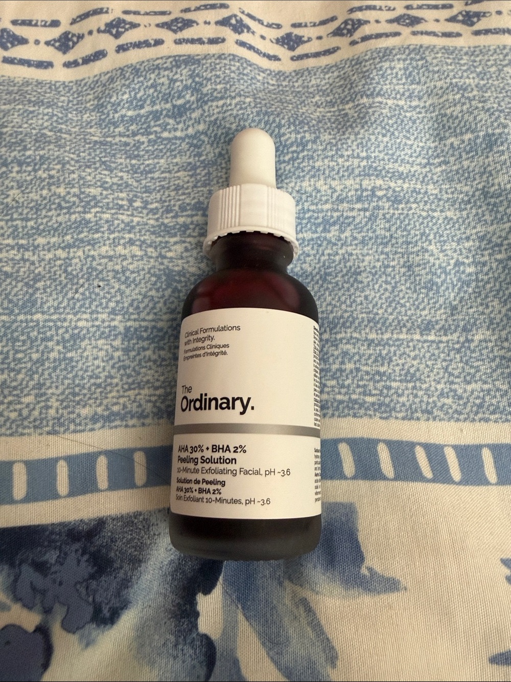 The Ordinary Peeling Solution in white and amber